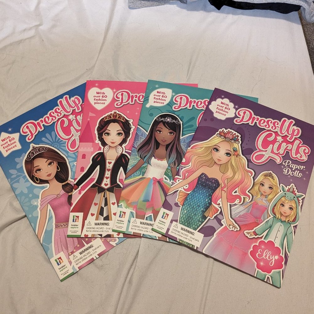 4 books of paper dolls...brand new